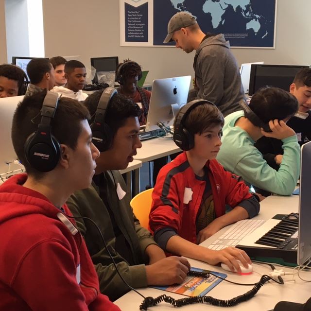 Boys looking at an computer